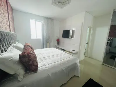 Uma cama ou camas num quarto em Cobertura Infinity Blue - Itapema/SC