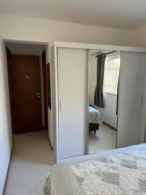 Uma cama ou camas num quarto em Meu Cantinho