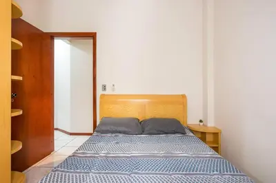 Uma cama ou camas num quarto em Itapema Beira Mar