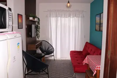 Uma televisão e/ou sistema de entretenimento em Enseada de Zimbros Residencial