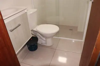 Uma casa de banho em Enseada de Zimbros Residencial