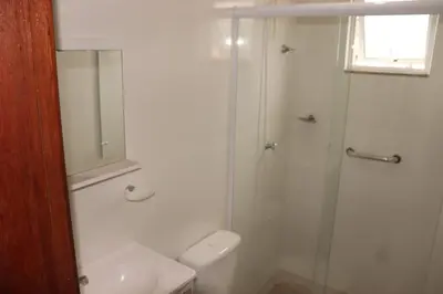 Uma casa de banho em Enseada de Zimbros Residencial