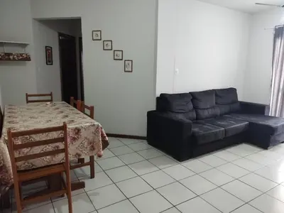 Uma área de estar em Apartamento de Praia no Centro