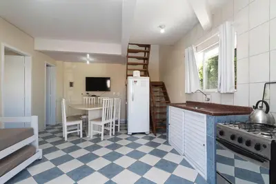 A cozinha ou kitchenette de Residencial Melfi 2 Apartamento com Piscina