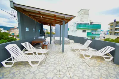 Uma varanda ou terraço em Residencial Melfi 2 Apartamento com Piscina