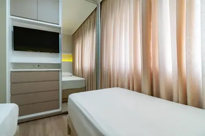Uma cama ou camas num quarto em Varandas do Atlântico - Apartamento Impecável em Condo Pé na Areia