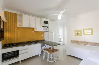A cozinha ou kitchenette de Bombinhas Tourist Apart