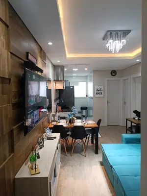 Uma televisão e/ou sistema de entretenimento em Aconchego azul do mar