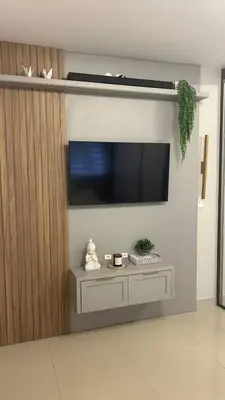 Uma televisão e/ou sistema de entretenimento em Residencial Bombinhas
