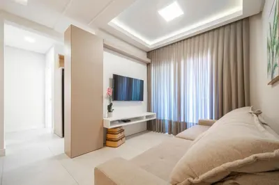 Uma televisão e/ou sistema de entretenimento em Mario Guilherme - Apto - 203 - Lindo apartamento condomínio de alto padrão com piscina e academia.