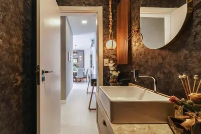 Uma casa de banho em Apartamento 2 suítes com Piscina Centro Bombinhas