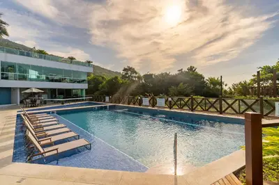 A piscina em ou perto de Varandas do Atlântico - Confortável Apartamento em Condo Pé na Areia