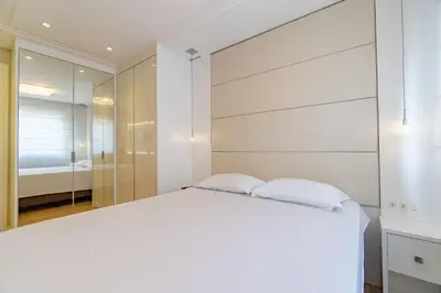 Uma cama ou camas num quarto em Varandas do Atlântico - Confortável Apartamento em Condo Pé na Areia