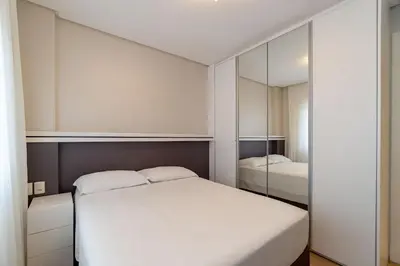 Uma cama ou camas num quarto em Varandas do Atlântico - Aconchegante Apartamento em Condo Pé na Areia