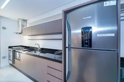 A cozinha ou kitchenette de Porto Madero 201 – 130 Metros do Mar do Centro