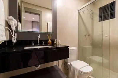 Uma casa de banho em Aion 104 - Flat c/ cozinha - 50 metros da praia