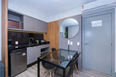 A cozinha ou kitchenette de Aion 202 - Loft c/ cozinha - 50 metros da Praia