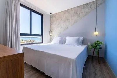 Uma cama ou camas num quarto em Aion 305 - Duplex compacto de luxo - 50 metros do mar!