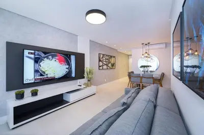 Uma televisão e/ou sistema de entretenimento em Adra 105 - 3 Quartos - 2 Vagas de Garagem | Centro de Bombinhas