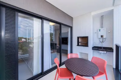 Uma televisão e/ou sistema de entretenimento em Adra 301 - Apartamento com 3 quartos - Centro de Bombinhas