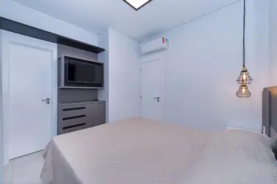 Uma cama ou camas num quarto em Adra 306 - Cobertura Duplex com 3 suítes - Centro de Bombinhas