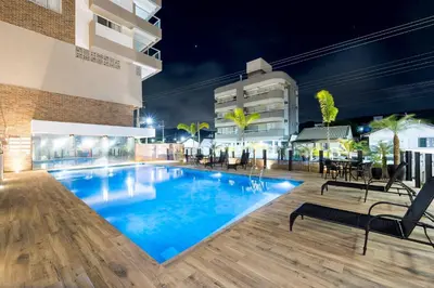 A piscina em ou perto de Terrazzo 402B - Apto 2 suítes em condomínio de luxo à 300 metros da Praia de Bombas