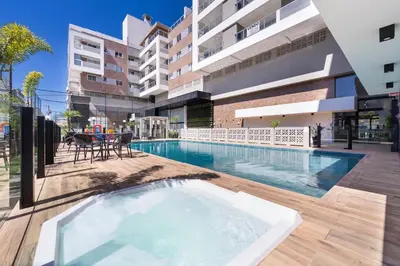 A piscina em ou perto de Terrazzo 402B - Apto 2 suítes em condomínio de luxo à 300 metros da Praia de Bombas