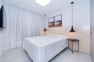 Uma cama ou camas num quarto em Adra 103 - 3 Quartos - 2 Vagas de Garagem | Centro de Bombinhas