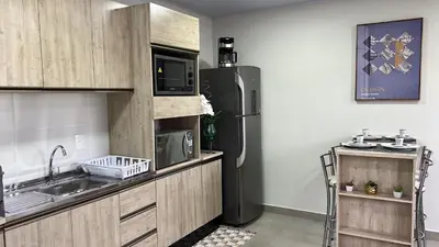 A cozinha ou kitchenette de APTO3 COM AR COND. WIFI E TV SMART