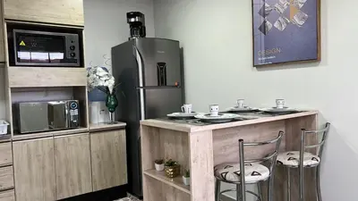 A cozinha ou kitchenette de APTO3 COM AR COND. WIFI E TV SMART