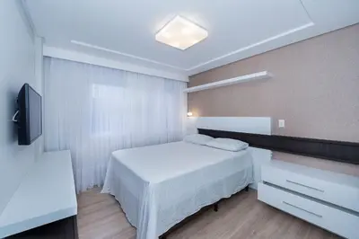 Uma cama ou camas num quarto em Varandas do Atlântico 01A – Frente Mar em Bombas