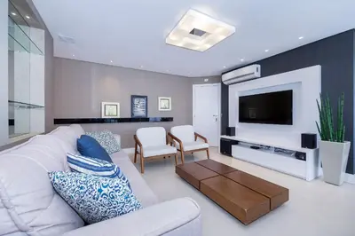 Uma televisão e/ou sistema de entretenimento em Apartamento 306B – Edifício Boulevard em Bombinhas