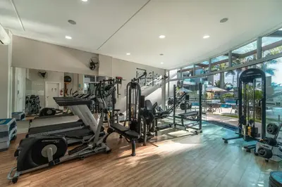 O centro de fitness e/ou as comodidades de fitness de Apartamento 306B – Edifício Boulevard em Bombinhas