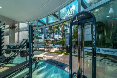 O centro de fitness e/ou as comodidades de fitness de Apartamento 306B – Edifício Boulevard em Bombinhas