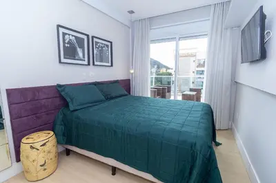 Uma cama ou camas num quarto em Apartamento 306B – Edifício Boulevard em Bombinhas