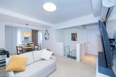Uma área de estar em Terrazzo 602B - Cobertura duplex 2 suítes em condomínio de luxo à 300 metros da Praia de Bombas