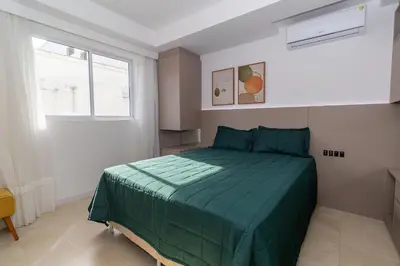 Uma cama ou camas num quarto em Terrazzo 602B - Cobertura duplex 2 suítes em condomínio de luxo à 300 metros da Praia de Bombas