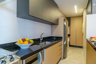 A cozinha ou kitchenette de Porto Madero - Amplo Apartamento em Condo com Piscina