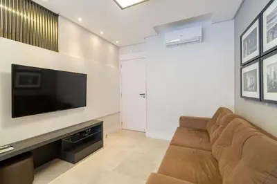 Uma televisão e/ou sistema de entretenimento em Porto Madero - Amplo Apartamento em Condo com Piscina