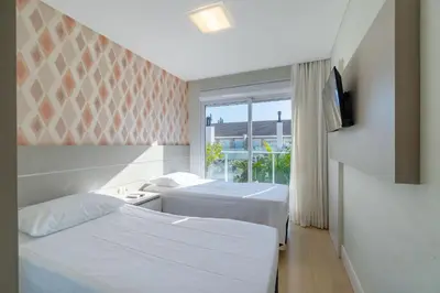 Uma cama ou camas num quarto em Cobertura Espetacular com Jacuzzi Privativa em Condo de Luxo