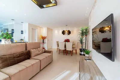 Uma televisão e/ou sistema de entretenimento em Cobertura Espetacular com Jacuzzi Privativa em Condo de Luxo