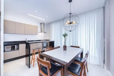 A cozinha ou kitchenette de Porto Madero 303 – 130 Metros do Mar do Centro