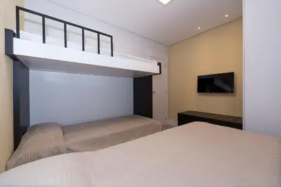 Uma cama ou camas num quarto em Porto Madero 303 – 130 Metros do Mar do Centro