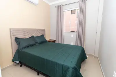 Uma cama ou camas num quarto em Palazzo Toscano 201 - Apto 3 quartos à 100 metros da praia de Bombas