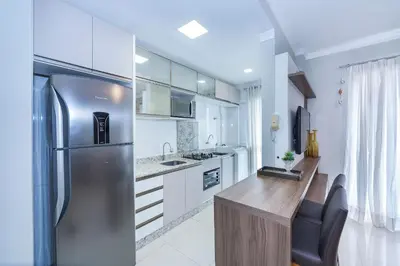 A cozinha ou kitchenette de Palazzo Toscano 201 - Apto 3 quartos à 100 metros da praia de Bombas