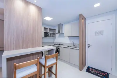 A cozinha ou kitchenette de Adra 106 - 3 Quartos - 2 Vagas de Garagem | Centro de Bombinhas