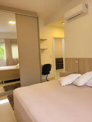Uma cama ou camas num quarto em Apartamento Residencial Mar Azul - praia de Palmas - Governador Celso Ramos-SC