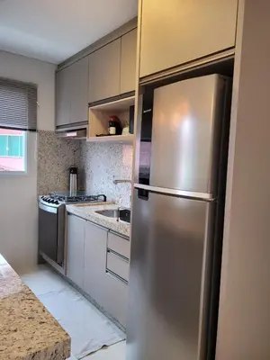 A cozinha ou kitchenette de Apartamento Residencial Mar Azul - praia de Palmas - Governador Celso Ramos-SC