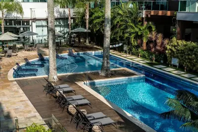 A piscina em ou perto de Boulevard 123 D - Apartamento com 3 dormitórios em elegante condomínio com piscina aquecida na praia do centro de Bombinhas