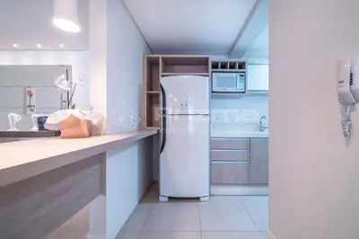 A cozinha ou kitchenette de Boulevard 123 D - Apartamento com 3 dormitórios em elegante condomínio com piscina aquecida na praia do centro de Bombinhas